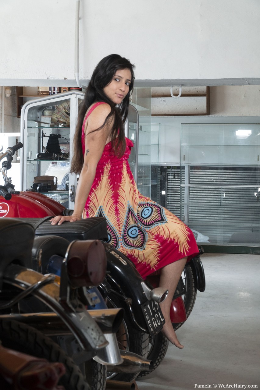 Brunette Doll Pamela Rubbing Her Super Hairy Pussy At The Bike Shop