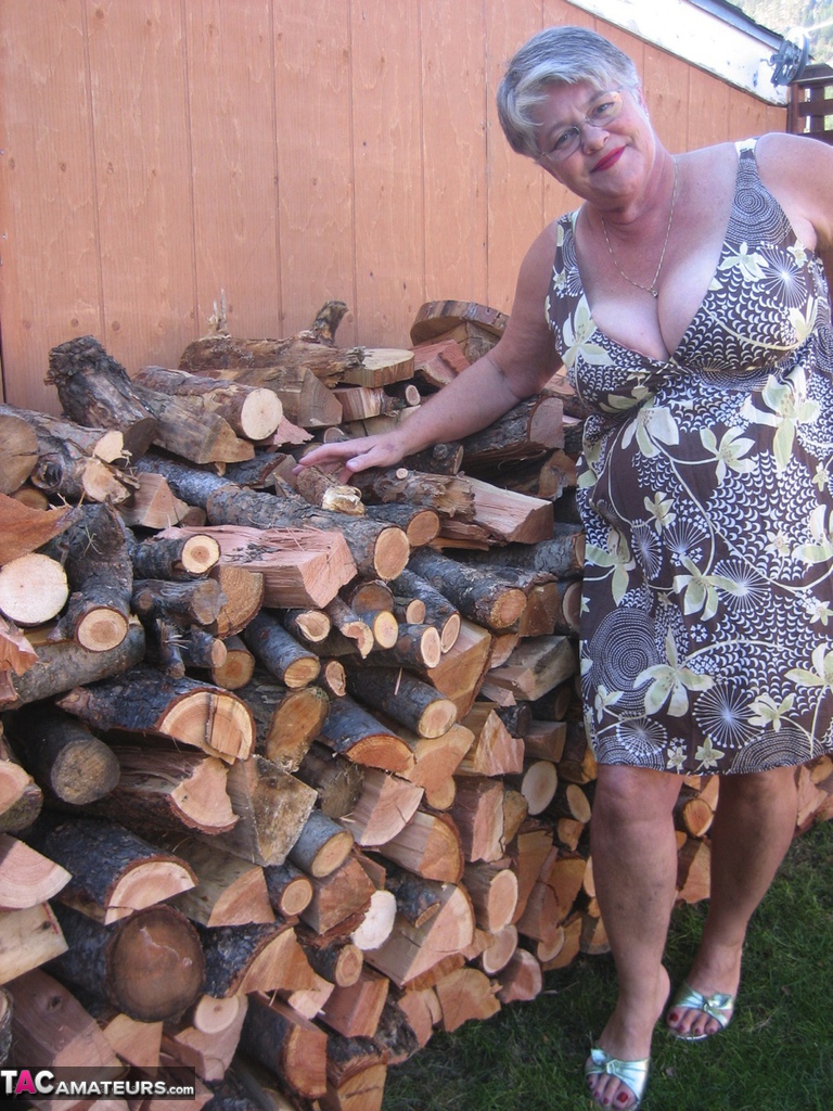 Brazen Granny Strips By Wood Pile To Show Off BBW Big Tits And Ass