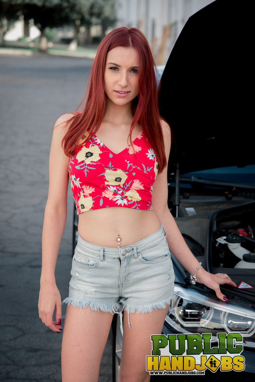 April Snow Gives Handjob To Car Repair Helper