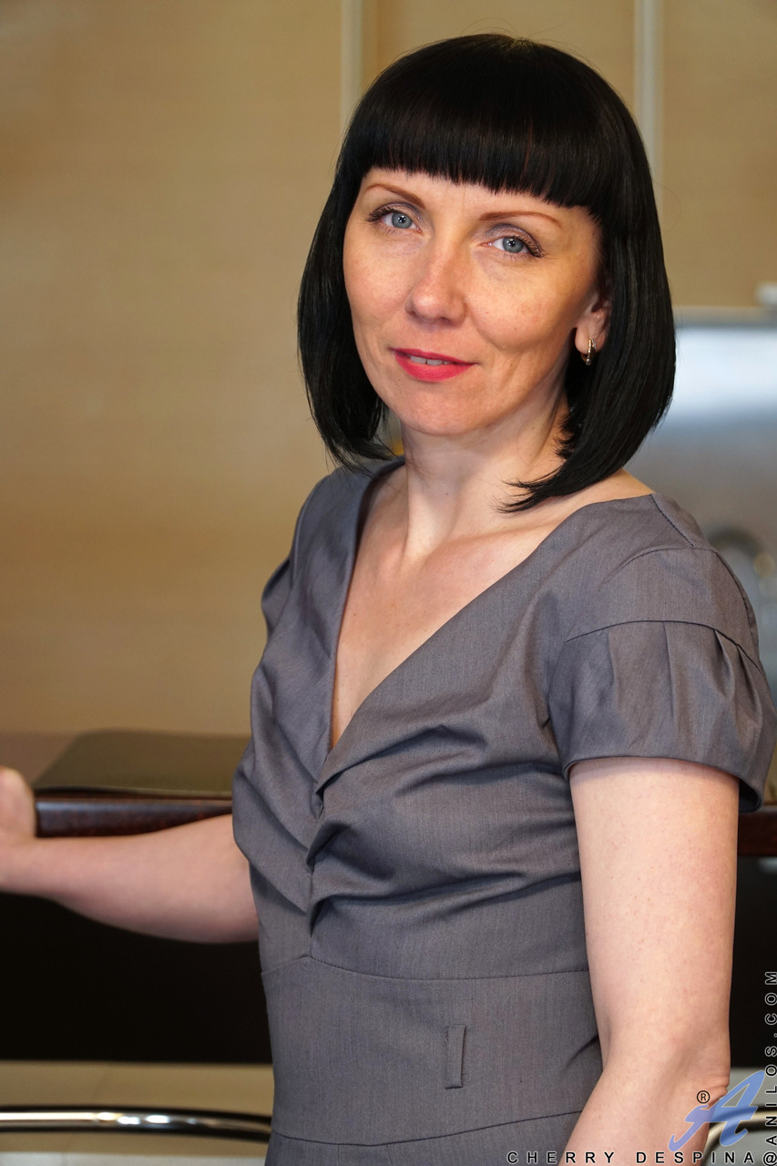 Mature Brunette Cherry Despina Strips Naked And Plays With Her Shaved Cunt