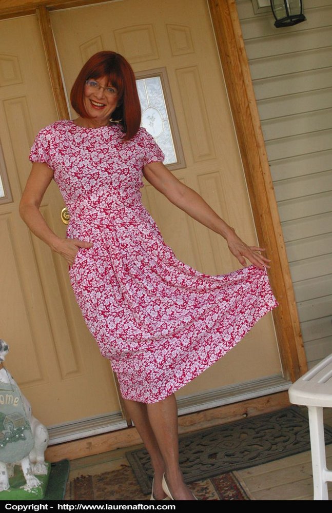 Mature Redhead In Glasses And Girdle Panties Plus Nylons Uncovers Her Boobs