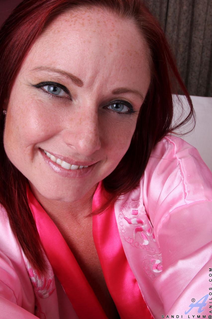 Redheaded Milf Sandi Lymm Flaunts Huge Curves And Masturbates