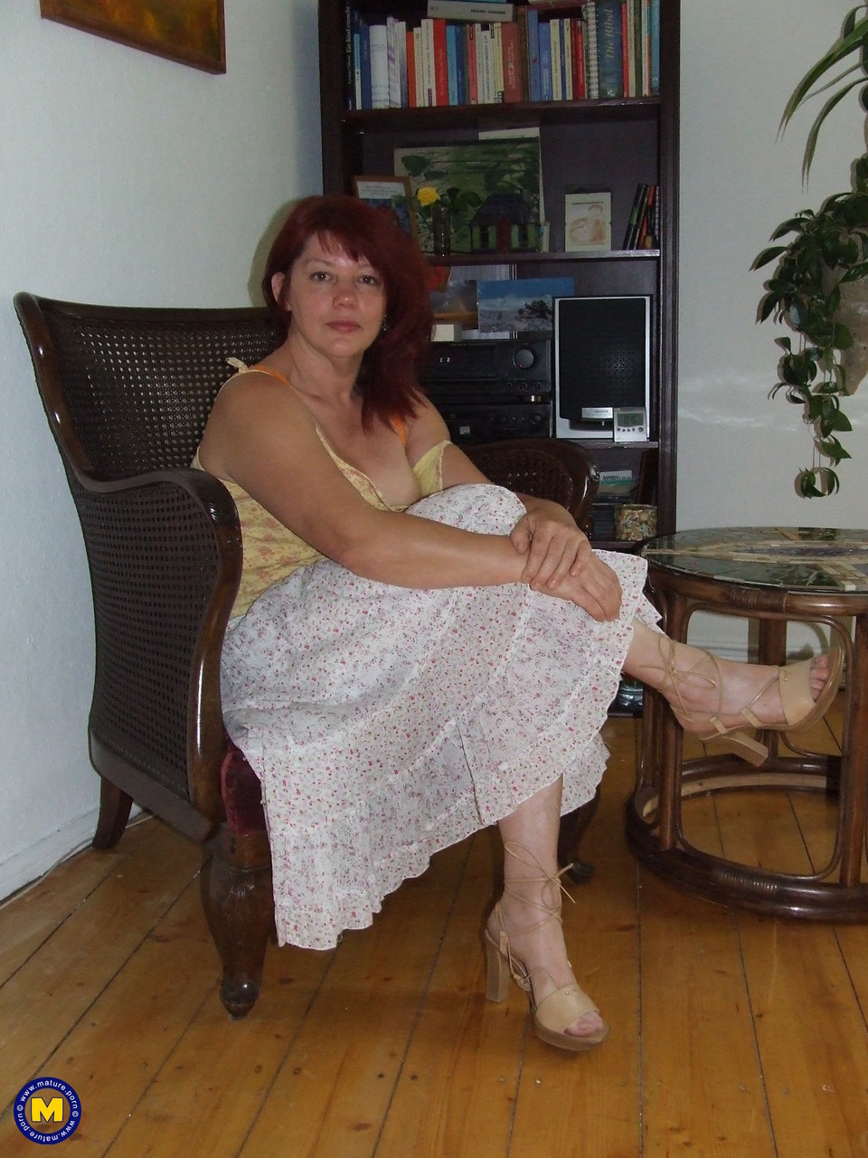 Mature Housewife Julia Undressing And Touching Herself In Chair