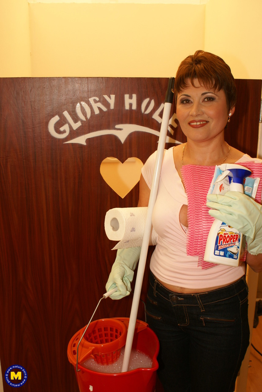 Short-Haired Cleaning Lady Malinda Finds Dick At Gloryhole And Gives Blowjob