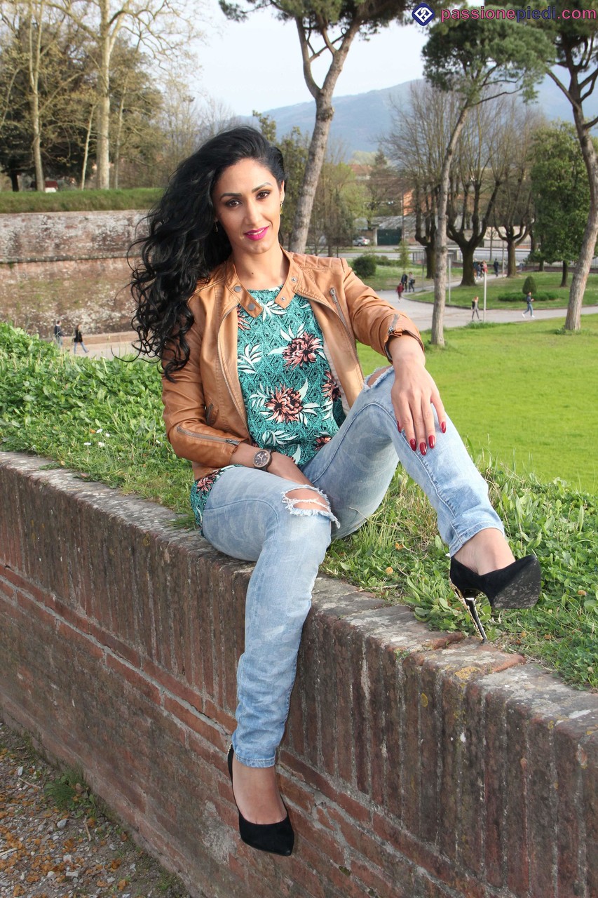 Dark-Haired Mistress Alexya Shows Bare Feet In Public Setting