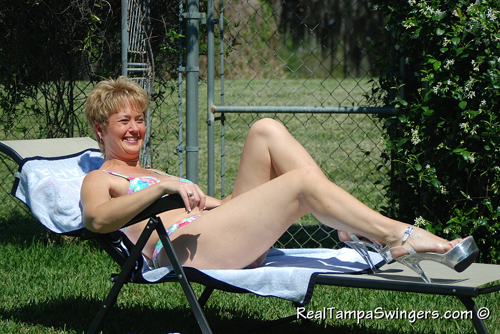 Mature Amateur Tracy Lick Flashes Her Cuddly Tits And Bald Pussy Outside