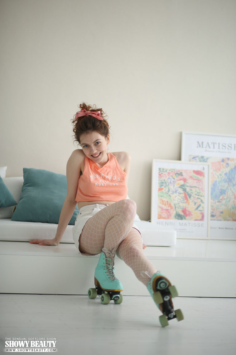 Cute Redheaded Teen Removes Roller Skates To Begin Striptease